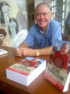 Cliff Richey signing his book "Acing Depression" at the US Open