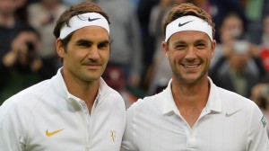 Marcus Willis (right) with Roger Federer