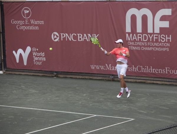 Dimitry Popko hitting a forehand at The Boulevard Club during the 2019 Mardy Fish Children's Foundation Tennis Championships